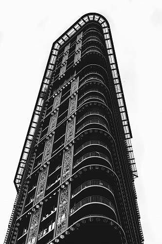 high rise grayscale photography of high-rise building during daytime black-and-white